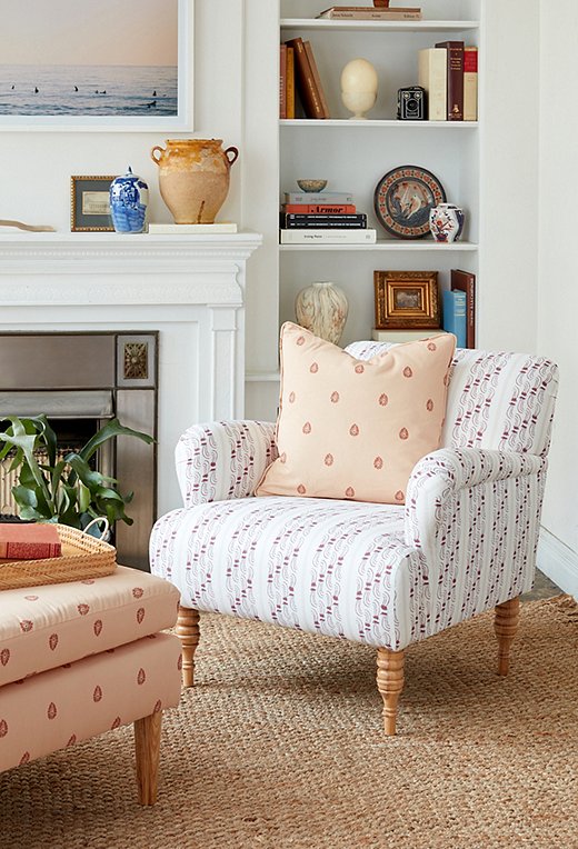 Club chairs aren’t necessarily masculine. Case in point: this upholstered beauty. (The pillow is from the same exclusive collection, Minnie Driver English Living.) Photo by Tony Vu.
